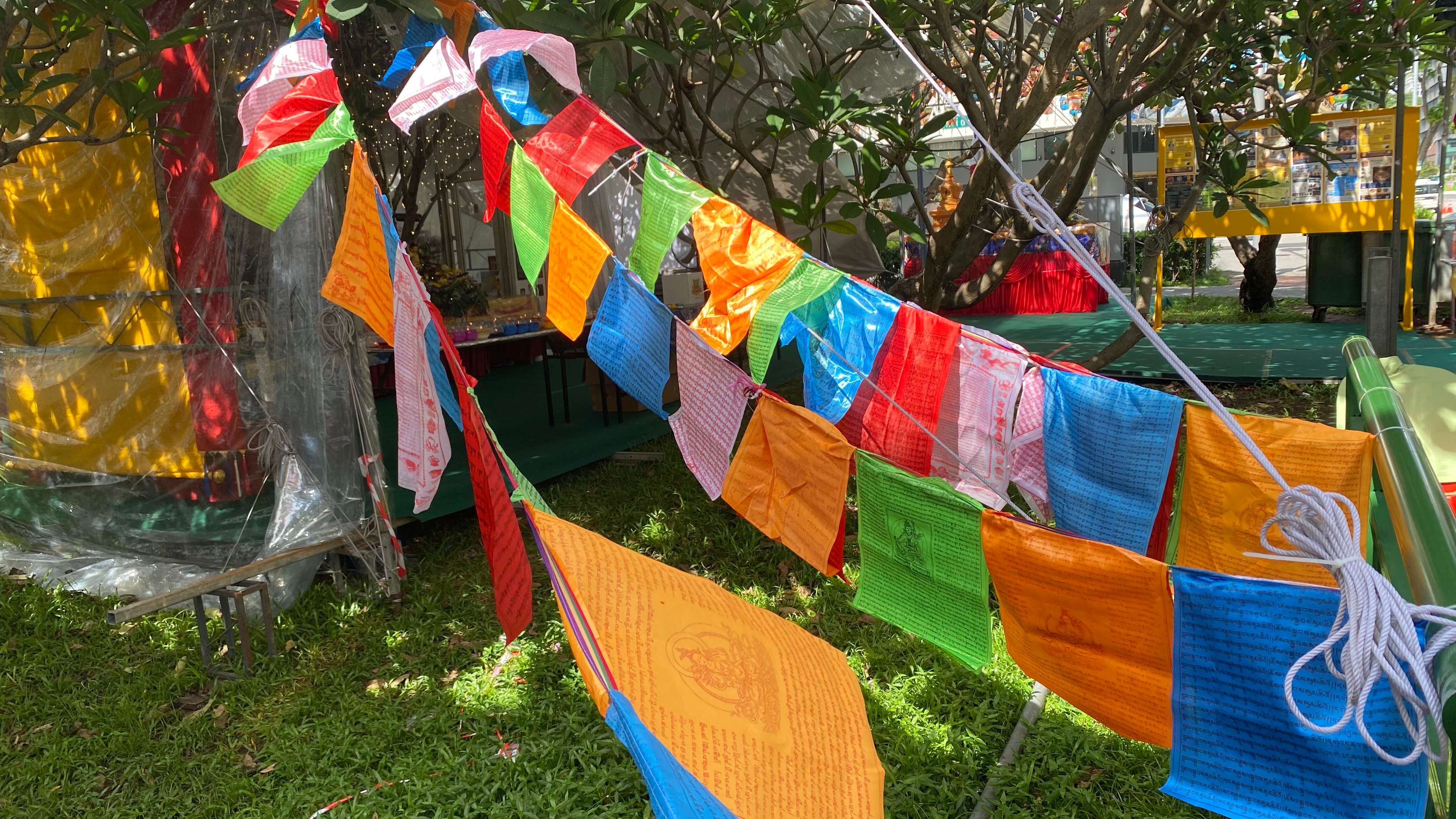 colourful flags outside a Buddhist temple